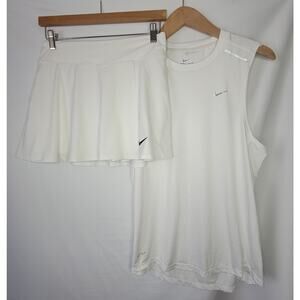 Nike- Women's 2 piece skirt and tank outfit- white in color-size small
